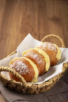 Berlin balls. Bread stuffed with icing cream. Stock Photos
