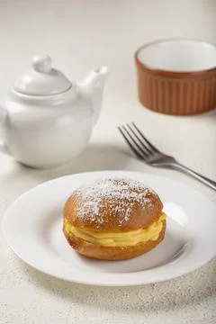 Berlin balls. Bread stuffed with icing cream. Stock Photos
