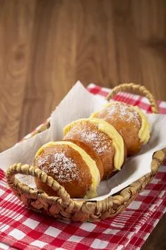 Berlin balls. Bread stuffed with icing cream. Stock Photos