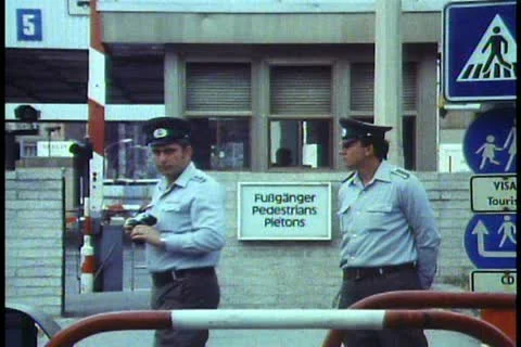 Berlin, Berlin Wall in 1988, East German guard photographs cameraman Stock Footage