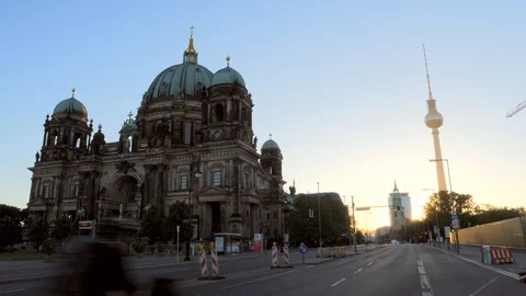 Berlin Cathedral at sunrise with a cyclist passing Stock Footage 87341453