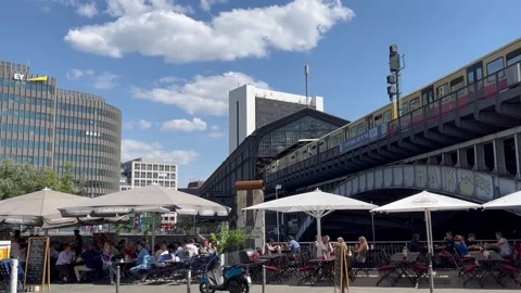 Berlin: City scene with S-Bahn train departing from Friedrichstrasse station, 4K Stock Footage 275552279