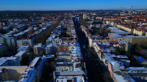 Berlin cityscape overview on a cold clear winter day. Smooth aerial view drone 動画素材 329037611