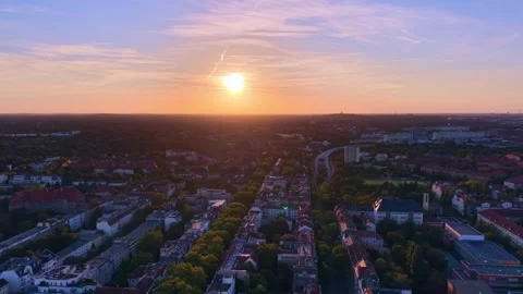 Berlin cityscape at Solar Eclipse golden hour with setting sun. Spectacular Stock Footage 344496415