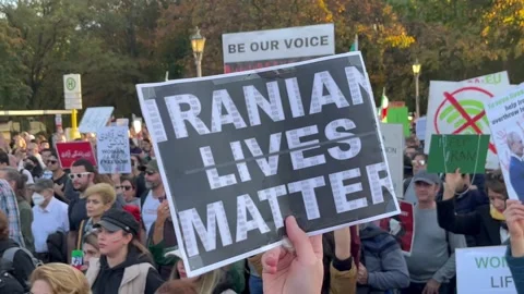 Berlin: Demonstrators show their solidarity with the protests in Iran, 4K Stock Footage 219721135