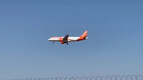 Berlin: Easyjet Airbus A320 jet approaches Berlin Airport for landing, 4K Stock Footage 202314871