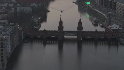 Berlin, Germany – 08/03/2025 – Approach to Oberbaum Bridge with boat Stock Footage 314788451