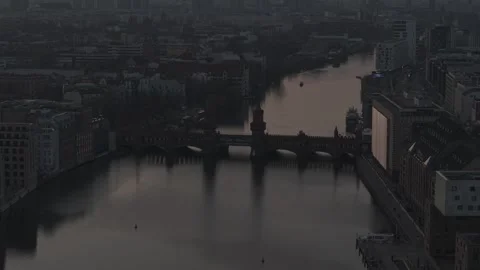Berlin, Germany – 08/03/2025 – Lateral left on Oberbaum Bridge with boat Stock Footage 314788513