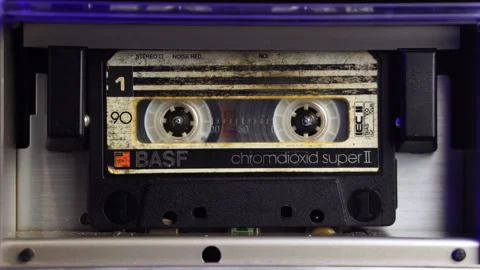 Berlin, Germany - 10/27/2024: Old BASF Audio Cassette Tape Rolling in Stock Footage 290282880