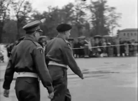 BERLIN, GERMANY - 1945: Parade arrivals - Officers arrive as rainy crowd watches Видео 344495751