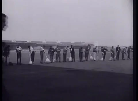 BERLIN, GERMANY - 1949: Apron queue - Civilians wait with sacks at airfield Video stock 344496382