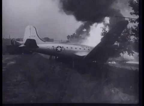 BERLIN, GERMANY - 1949: Crash response - Firefighters tackle burning plane Video stock 344496329