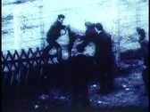 Berlin, Germany, 1961, B&Amp;W Archival, People Running Through Barbed Wire Fence Stock Footage