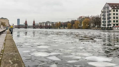 Berlin, Germany 2021- Winter Time Lapse of floating ice on river Spree and Stock Footage 150000788