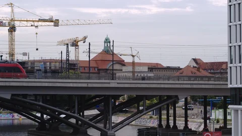 BERLIN, GERMANY - 23 JUN 2018: Modern express train on the railway bridge over Stock Footage 98364207