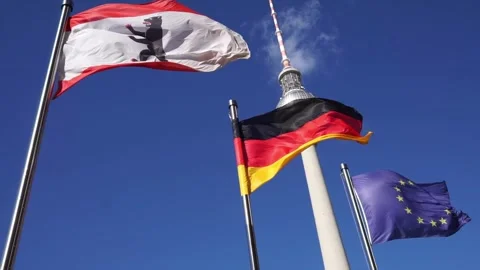 Berlin, Germany - April 6, 2026: Berlin, German and EU flag waving near TV Tower Vídeo Stock 333473019