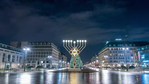 BERLIN, GERMANY - DECEMBER 2020 Hanukkah menorah and Christmas tree at Pariser Stock Footage