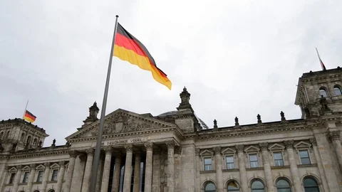 BERLIN, GERMANY. German flag fluttering in the wind in front of Reichstagin Stock Footage 127154386