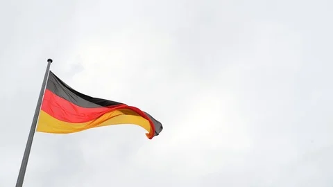BERLIN GERMANY. German flags fluttering in moody day on sky background Stock-Footage 127154388