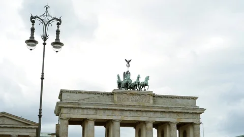 BERLIN, GERMANY. German flags fluttering in the wind in back side of Reichstagin Stock Footage 127154411
