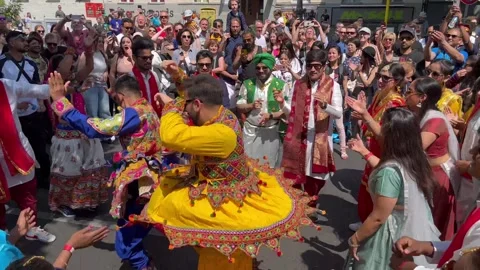Berlin, Germany: An Indian dance group performs at the Carnival of Cultures, 4K Stock Footage 242350967