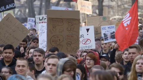 BERLIN GERMANY MARCH, 23, 2019 :People protesting in Berlin City Stock Footage 105160043
