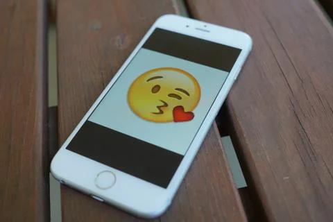 Berlin, Germany - May 18, 2017: emoticon icons on the screen of an Apple iphone Stock Photos