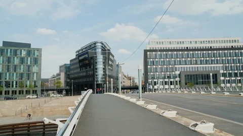 Berlin, Germany, May 2018: Modern Berlin is an elegant pedestrian bridge, a ship Stock Footage 89686761