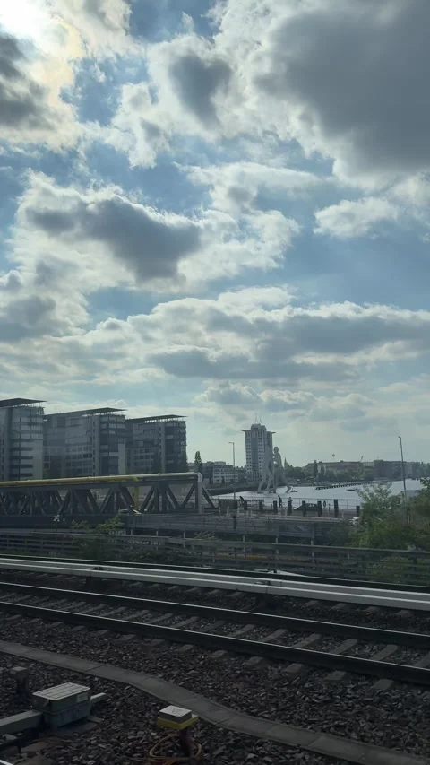 Berlin, Germany - May 23, 2026 - urban landscape view from a train, showcasing 스톡 동영상 335813815