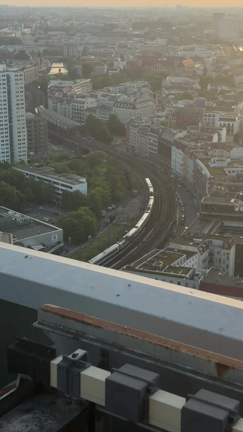 Berlin, Germany - May 23, 2026 - white passenger train travels along curved 스톡 동영상 335813824