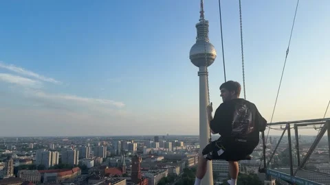Berlin, Germany - May 23, 2026 - young adult male person experiencing a thrill Stock Footage 336311051