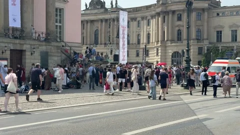 Berlin, Germany - May 23, 2026 - large urban crowd featuring diverse adult Stock Footage 336311077