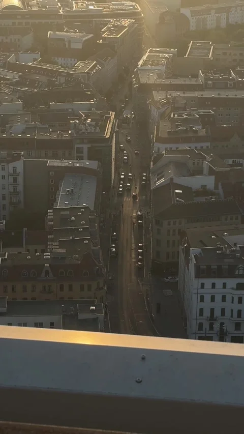Berlin, Germany - May 23, 2026 - elevated perspective observes urban movement on Stock Footage 337191275
