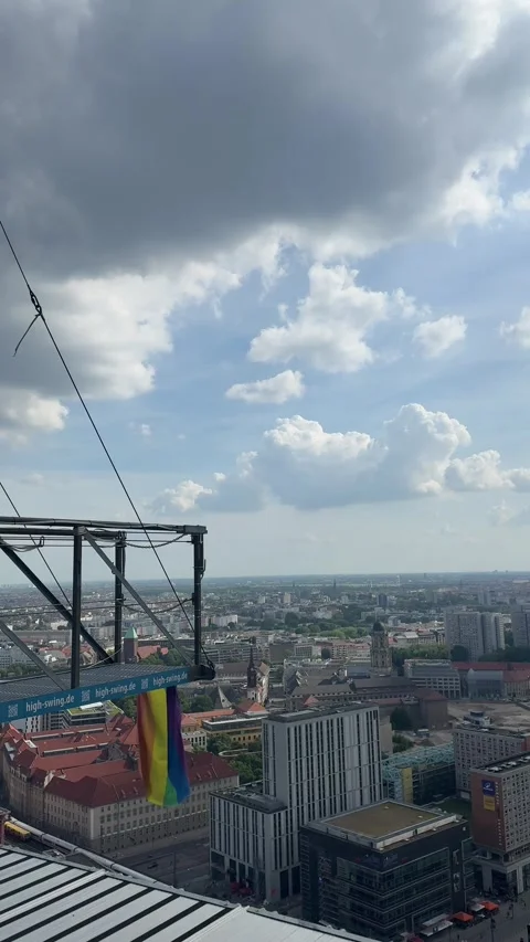 Berlin, Germany - May 23, 2026 - woman enjoys thrilling high swing adventure Stock Footage 339090102
