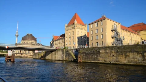 BERLIN GERMANY MAY 26 2017 Building on Spree from boat view in sunset. 스톡 동영상 127154059
