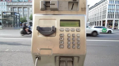 Berlin, Germany - May 30, 2025: Out-of-service Telekom payphone Stock Footage 310526673
