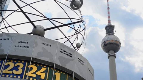 BERLIN GERMANY Monument of Clock with world time on Alexanderplatz, tv tower Stock Footage 127153803