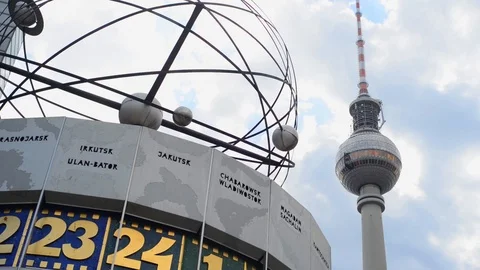 BERLIN GERMANY Monument of Clock with world time on Alexanderplatz with tv tower Stock-Footage 127153806
