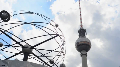 BERLIN GERMANY Monument of Clock with world time on Alexanderplatz, tv tower Stock Footage 127153819