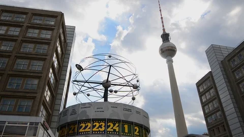 BERLIN GERMANY Monument of Clock with world time on Alexanderplatz and tv tower Stock Footage 127153828