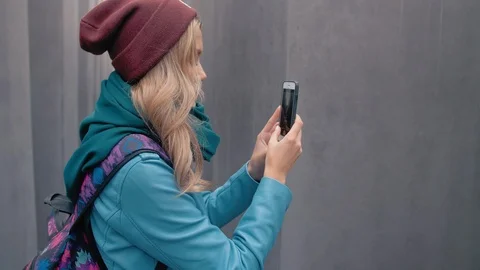 BERLIN, GERMANY - October 2018: Slow Motion Caucasian girl tourist with a Stock Footage 106823949