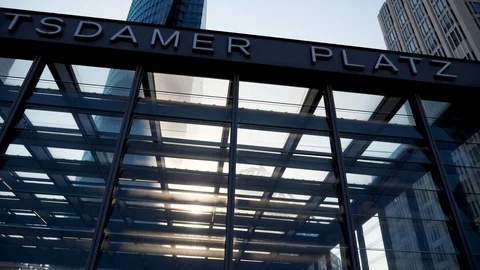 Berlin, Germany, Potsdamer Platz train station exterior pan shot in slow motion. 動画素材 116257137