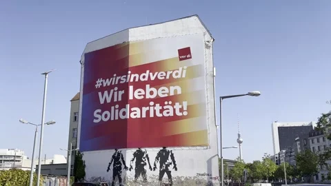 Berlin: Huge banner of the United Services Trade Union (Verdi Gewerkschaft), 4K Stock Footage 285175604