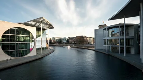 Berlin Hyperlapse Featuring a Passenger Boat Traveling Along the River Canal Stock-Footage 331103243