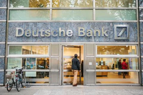 Berlin, October 2, 2017: Unknown man walks into the beautiful glass office of Stock Photos