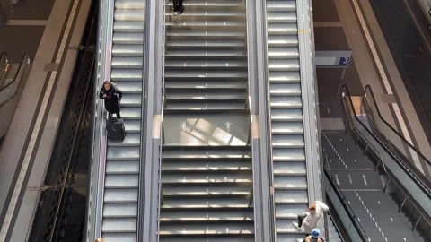 Berlin: People on escalators at Central Train Station during union strike, 4K Stock Footage 267121866