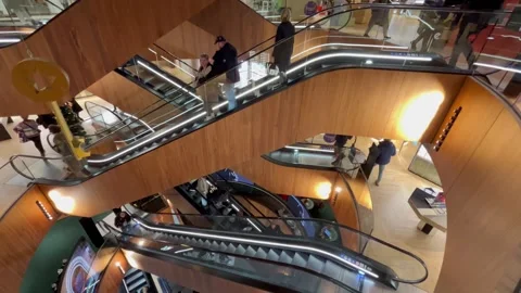 Berlin: People ride on escalators at the KaDeWe department store, 4K Stock Footage 258667721