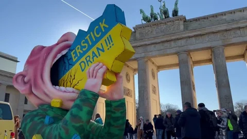 Berlin: Protest carnival float with Putin devouring the Ukraine, 4K Stock Footage 171831264