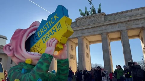 Berlin: Protest carnival float with Putin devouring the Ukraine, 4K Stock Footage 171831296