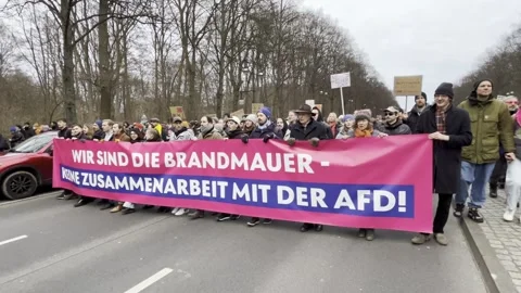 Berlin: Protest march against AfD and for preservation of political firewall, 4K Stock Footage 300789870